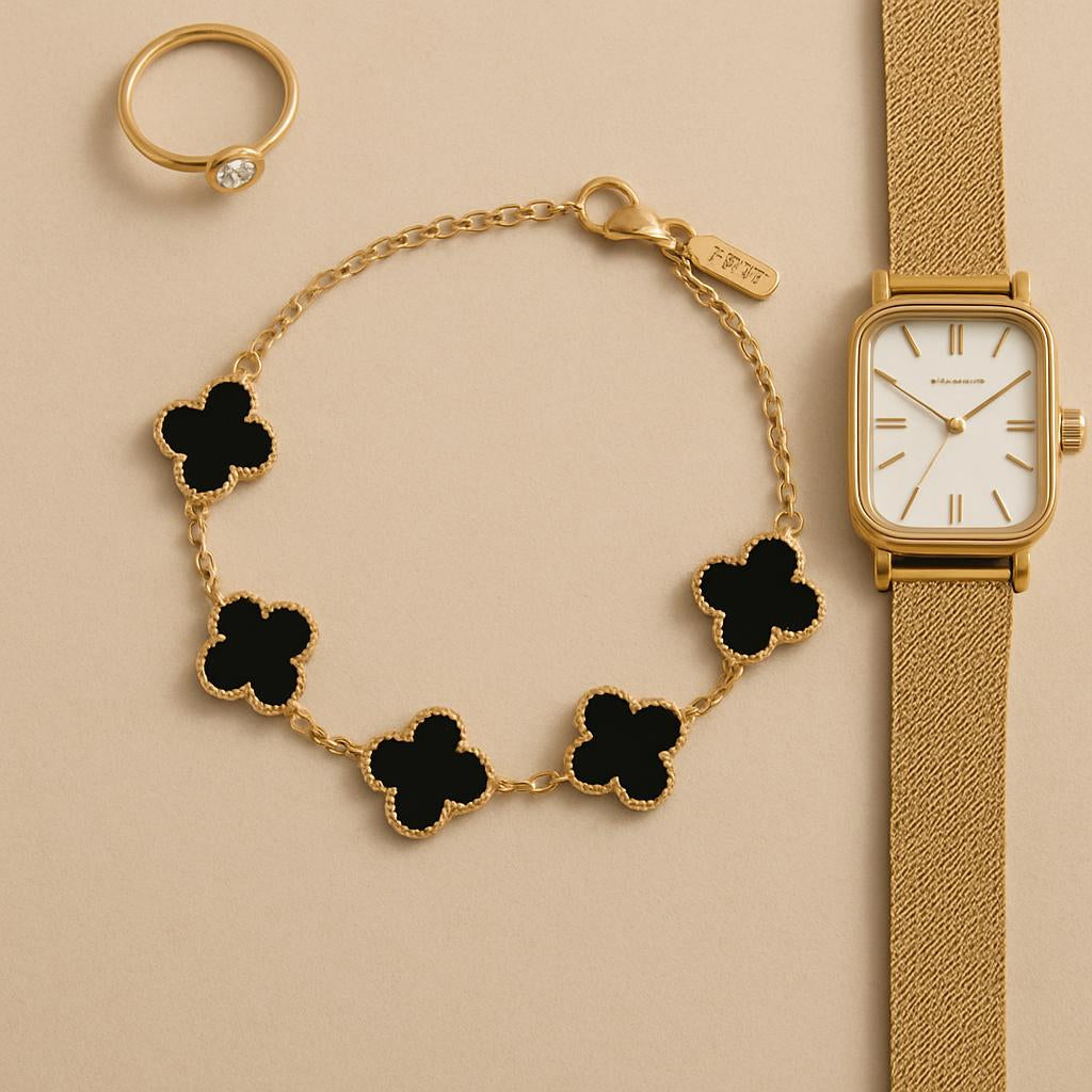 An artistic flat lay of the bracelet alongside complementary accessories such as a delicate ring and a classy watch, arranged on a neutral-toned background, emphasizing the bracelet's modern elegance, hypoallergenic quality, and adjustable feature.