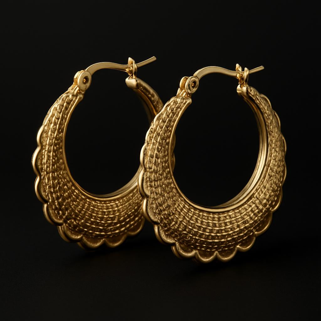 Studio shot showcasing the earrings from a side angle to display the intricate textured design and secure hoop fastening, with a simple black or white backdrop to focus on the product details.